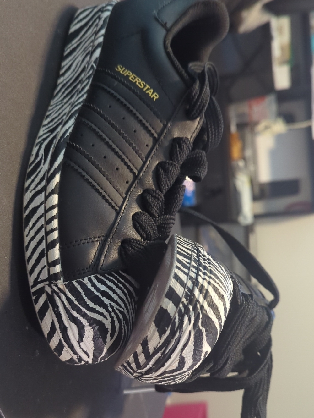 adidas Superstar Black Sneakers with Zebra-Print Sole
